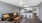 a living room with a couch and a table