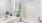 a bathroom with a shower and sink