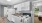 a kitchen with white cabinets