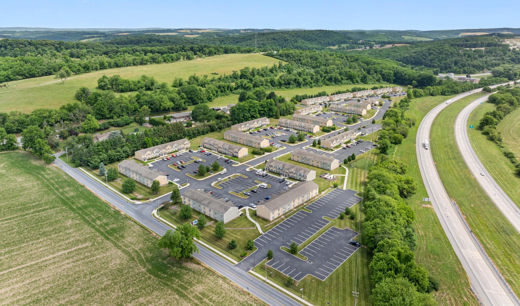 a large building surrounded by trees