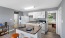 a kitchen with white cabinets
